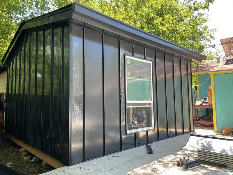 Black standing seam metal wall panels for Metal Roof Installation in Minnetonka