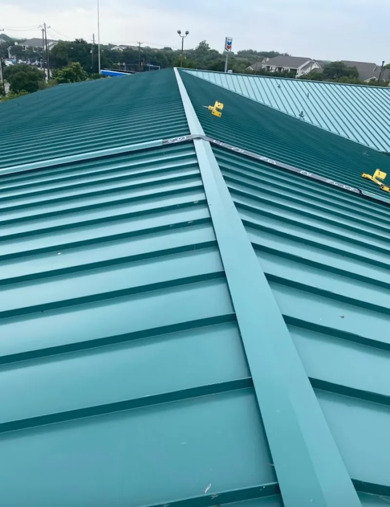 Green commercial metal roof ridge and valley for Metal Roof Repair in Minnetonka