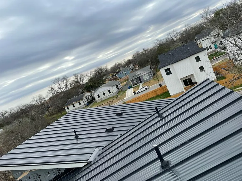 Standing seam metal roof panels with vents for Skylight Repair in Minnetonka